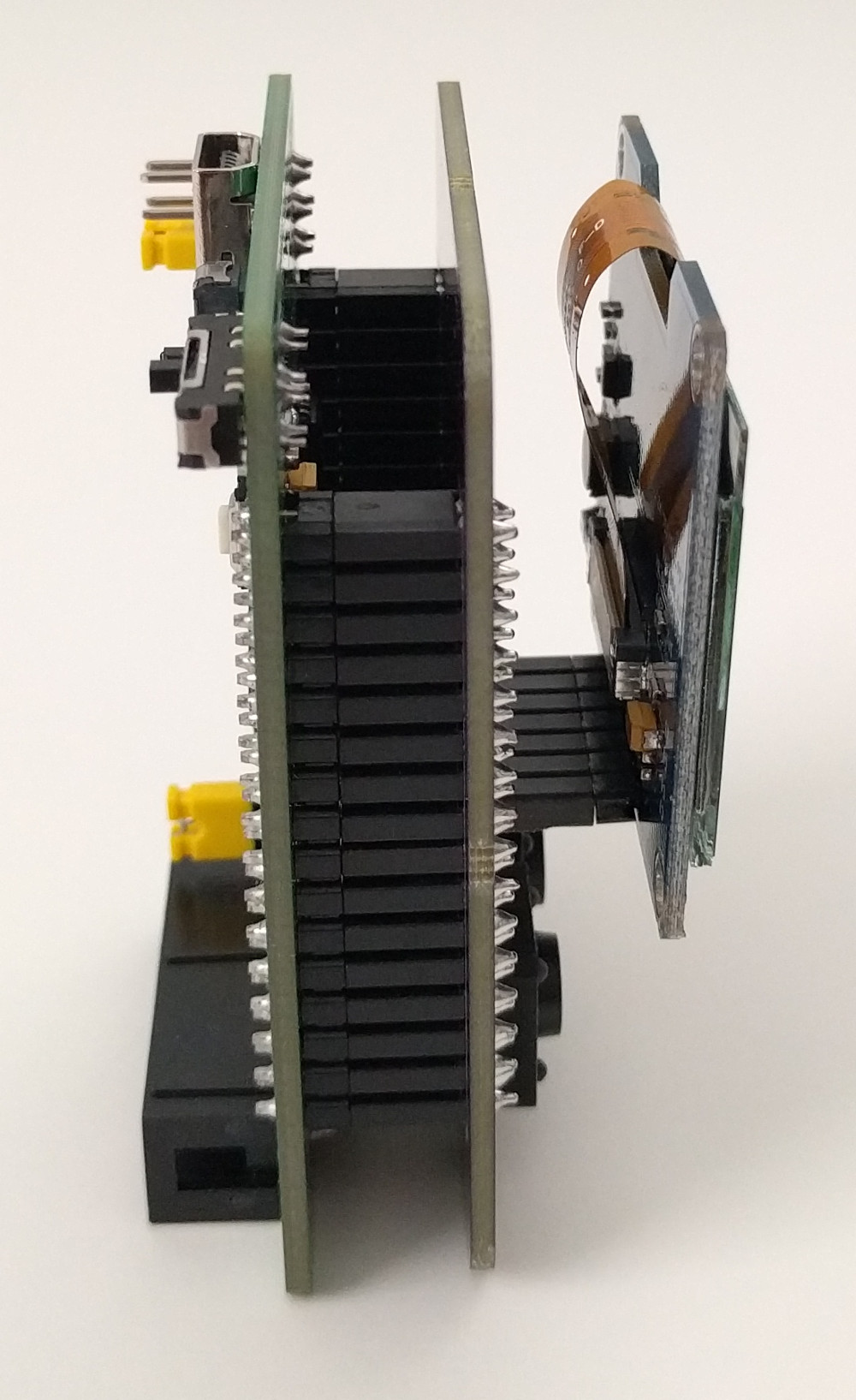 Side view, PWB and display module stacked on the dev board